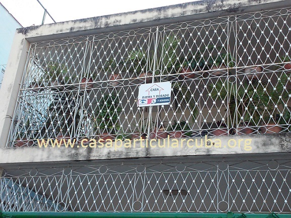 'Front view and sign' Casas particulares are an alternative to hotels in Cuba.